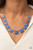 Bright geometric square and round beads in the Pantone® of French Blue are pressed into simple silver frames to create a lively statement below the collar. Features an adjustable clasp closure.
Sold as one individual necklace. Includes one pair of matching earrings. Bright geometric square and round beads in the Pantone® of French Blue are pressed into simple silver frames to create a lively statement below the collar. Features an adjustable clasp closure.
Sold as one individual necklace. Includes one pair of matching earrings.