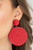 A generous disc of red thread spirals around and around for a dizzying finish as it connects to a red button post. Earring attaches to a standard post fitting.
Sold as one pair of post earrings. A generous disc of red thread spirals around and around for a dizzying finish as it connects to a red button post. Earring attaches to a standard post fitting.
Sold as one pair of post earrings.