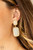 Encased in sleek gold frames, milky white beads link into an oversized lure for a whimsically refined flair. Earring attaches to a standard clip-on fitting.

Sold as one pair of clip-on earrings.
