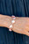 A collection of classic white pearls, Pale Rosette pearls glazed in a reflective finish, and iridescent teardrops wrap around the wrist in an ethereal display. Rose gold frames encase each bead, adding a romantic vibe to the vintage inspired design. Features an adjustable clasp closure.
Sold as one individual bracelet. A collection of classic white pearls, Pale Rosette pearls glazed in a reflective finish, and iridescent teardrops wrap around the wrist in an ethereal display. Rose gold frames encase each bead, adding a romantic vibe to the vintage inspired design. Features an adjustable clasp closure.
Sold as one individual bracelet.