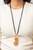 Three shimmery wavy gold discs, featuring a wavy pattern flowing across the front, link together in graduating sizes at the end of a lengthened black cord for an alluring appeal. Features an adjustable clasp closure.
Sold as one individual necklace. Includes one pair of matching earrings. Three shimmery wavy gold discs, featuring a wavy pattern flowing across the front, link together in graduating sizes at the end of a lengthened black cord for an alluring appeal. Features an adjustable clasp closure.
Sold as one individual necklace. Includes one pair of matching earrings.