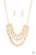 Three rows of gold chains with oversized hammered oval links attach to gold bars for an edgy display below the collar. Features an adjustable clasp closure.

Sold as one individual necklace. Includes one pair of matching earrings.