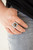 Chiseled into a tranquil square, an earthy tiger's eye stone is pressed into the center of a square frame etched in linear patterns for a rustic finish. Features a stretchy band for a flexible fit.
Sold as one individual ring. Chiseled into a tranquil square, an earthy tiger's eye stone is pressed into the center of a square frame etched in linear patterns for a rustic finish. Features a stretchy band for a flexible fit.
Sold as one individual ring.