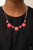 A bubbly collection of round Raspberry Sorbet beads are pressed into sleek silver fittings as they connect beneath the collar, creating a powerful pop of color. Features an adjustable clasp closure.
Sold as one individual necklace. Includes one pair of matching earrings. A bubbly collection of round Raspberry Sorbet beads are pressed into sleek silver fittings as they connect beneath the collar, creating a powerful pop of color. Features an adjustable clasp closure.
Sold as one individual necklace. Includes one pair of matching earrings.