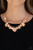 Featuring diamond shaped shiny copper fittings, a mismatched collection of hammered shiny copper discs swings from a classic shiny copper chain below the collar for an eye-catching finish. Features an adjustable clasp closure.
Sold as one individual necklace. Includes one pair of matching earrings. Featuring diamond shaped shiny copper fittings, a mismatched collection of hammered shiny copper discs swings from a classic shiny copper chain below the collar for an eye-catching finish. Features an adjustable clasp closure.
Sold as one individual necklace. Includes one pair of matching earrings.