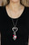 A flirtatiously mismatched collection of Raspberry Sorbet beads and ornate silver heart charms swing from the bottom of an oversized silver heart pendant at the bottom of a lengthened silver chain. Glassy white rhinestones are sprinkled through the collection, adding a sparkly finish to the romantic collaboration. Features an adjustable clasp closure.
Sold as one individual necklace. Includes one pair of matching earrings. A flirtatiously mismatched collection of Raspberry Sorbet beads and ornate silver heart charms swing from the bottom of an oversized silver heart pendant at the bottom of a lengthened silver chain. Glassy white rhinestones are sprinkled through the collection, adding a sparkly finish to the romantic collaboration. Features an adjustable clasp closure.
Sold as one individual necklace. Includes one pair of matching earrings.