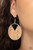Featuring hints of white accents, an earthy piece of cork is placed into the center of a circular hoop. A triangular slice is removed from the cork, creating an edgy airy finish. Earring attaches to a standard fishhook fitting.
Sold as one pair of earrings. Featuring hints of white accents, an earthy piece of cork is placed into the center of a circular hoop. A triangular slice is removed from the cork, creating an edgy airy finish. Earring attaches to a standard fishhook fitting.
Sold as one pair of earrings.