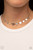 Delicately scratched in shimmer, a dainty collection of flat silver heart frames gradually increases in size along a shiny silver snake chain around the neck for a flirtatious fashion. Features an adjustable clasp closure.

Sold as one individual choker necklace. Includes one pair of matching earrings.