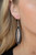 Bordered in a black leather trim, an airy silver leaf frame swings from the ear for a wildly seasonal fashion. Earring attaches to a standard fishhook fitting.
Sold as one pair of earrings. Bordered in a black leather trim, an airy silver leaf frame swings from the ear for a wildly seasonal fashion. Earring attaches to a standard fishhook fitting.
Sold as one pair of earrings.