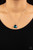 A faceted asymmetrical blue gem is encased in a sleek silver frame at the bottom of a silver popcorn chain, creating a stellar pendant below the collar. Features an adjustable clasp closure.
Sold as one individual necklace. Includes one pair of matching earrings. A faceted asymmetrical blue gem is encased in a sleek silver frame at the bottom of a silver popcorn chain, creating a stellar pendant below the collar. Features an adjustable clasp closure.
Sold as one individual necklace. Includes one pair of matching earrings.