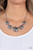 Hammered in a rustic finish, an asymmetrical collection of beveled silver frames are adorned with textured and smooth bands of silver. Gradually increasing in size, the centermost frame features a row of glassy black rhinestones for a splash of glitz below the collar. Features an adjustable clasp closure.
Sold as one individual necklace. Includes one pair of matching earrings. Hammered in a rustic finish, an asymmetrical collection of beveled silver frames are adorned with textured and smooth bands of silver. Gradually increasing in size, the centermost frame features a row of glassy black rhinestones for a splash of glitz below the collar. Features an adjustable clasp closure.
Sold as one individual necklace. Includes one pair of matching earrings.