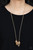 Featuring white rhinestones, faceted surfaces, twisted finishes, and chain-like patterns, an edgy collection of mismatched gold rings glide along a lengthened gold popcorn chain in a glamorously gritty finish. Features an adjustable clasp closure.
Sold as one individual necklace. Includes one pair of matching earrings. Featuring white rhinestones, faceted surfaces, twisted finishes, and chain-like patterns, an edgy collection of mismatched gold rings glide along a lengthened gold popcorn chain in a glamorously gritty finish. Features an adjustable clasp closure.
Sold as one individual necklace. Includes one pair of matching earrings.