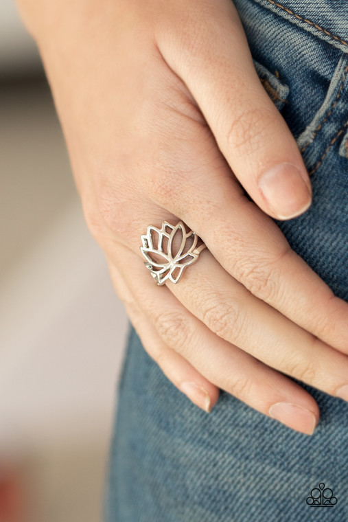 Dainty silver bars delicately climb the finger, blooming into a whimsical lotus centerpiece. Features a dainty stretchy band for a flexible fit.

Sold as one individual ring.