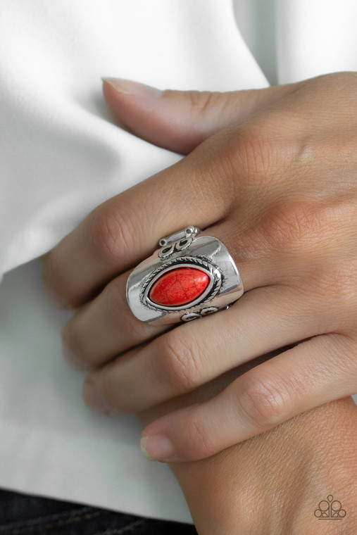 Chiseled into a tranquil marquise shape, a fiery red stone is pressed into the center of an ornate silver frame as it folds around the finger. Features a stretchy band for a flexible fit.

Sold as one individual ring.