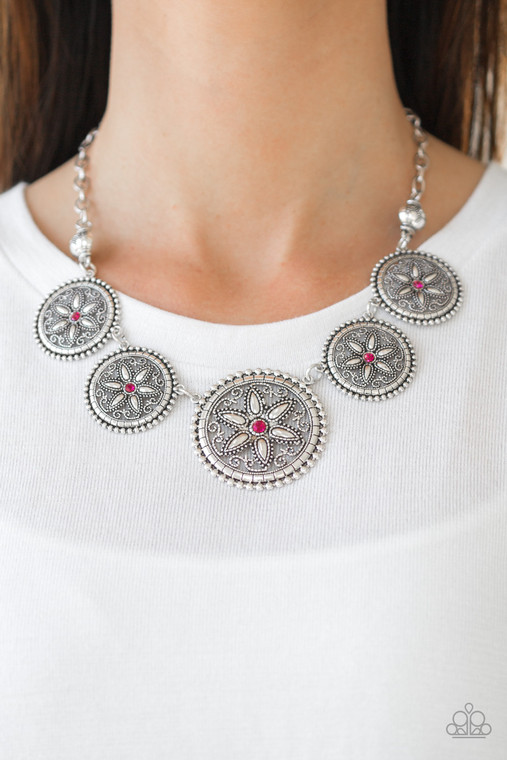 Dotted with glittery pink rhinestone centers, floral silver frames gradually increase in size as they link below the collar for a whimsical look. Features an adjustable clasp closure.

Sold as one individual necklace. Includes one pair of matching earrings.