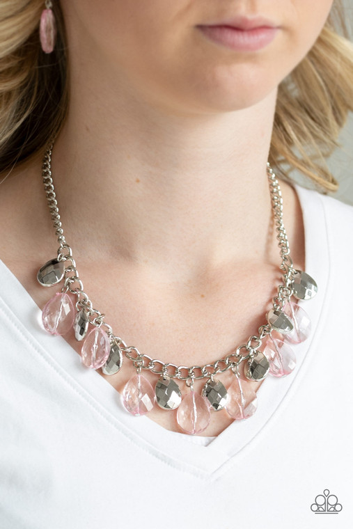 Faceted silver and glassy pink teardrops swing from the bottom of a thick silver chain, creating a vivacious fringe below the collar. Features an adjustable clasp closure.

Sold as one individual necklace. Includes one pair of matching earrings.