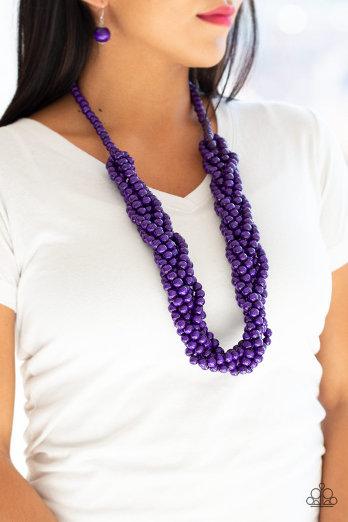 Brushed in a flirty purple finish, strands of vivacious wooden beads subtly twist across the chest for a summery look.

Sold as one individual necklace. Includes one pair of matching earrings.