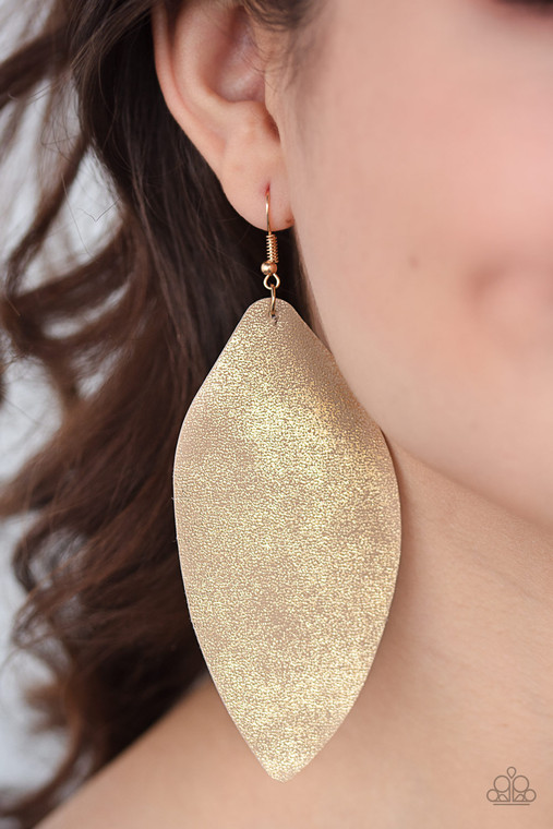 Dusted in a golden shimmer, an asymmetrical piece of leather swings from the ear in a statement-making fashion. Earring attaches to a standard fishhook fitting.

Sold as one pair of earrings.