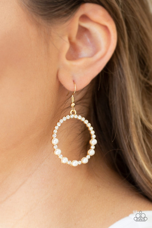 Encrusted in glassy white rhinestones, the bottom of a glistening gold hoop is dotted in bubbly white pearls for a refined fashion. Earring attaches to a standard fishhook fitting.

Sold as one pair of earrings.