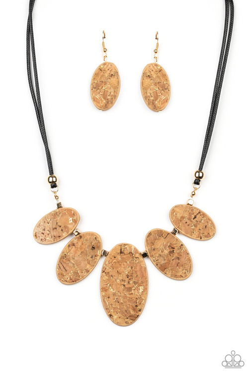 Featuring natural cork-like finishes, oval frames and shimmery gold cube beads flare out into an earthy fringe below the collar. Features an adjustable clasp closure.

Sold as one individual necklace. Includes one pair of matching earrings.
