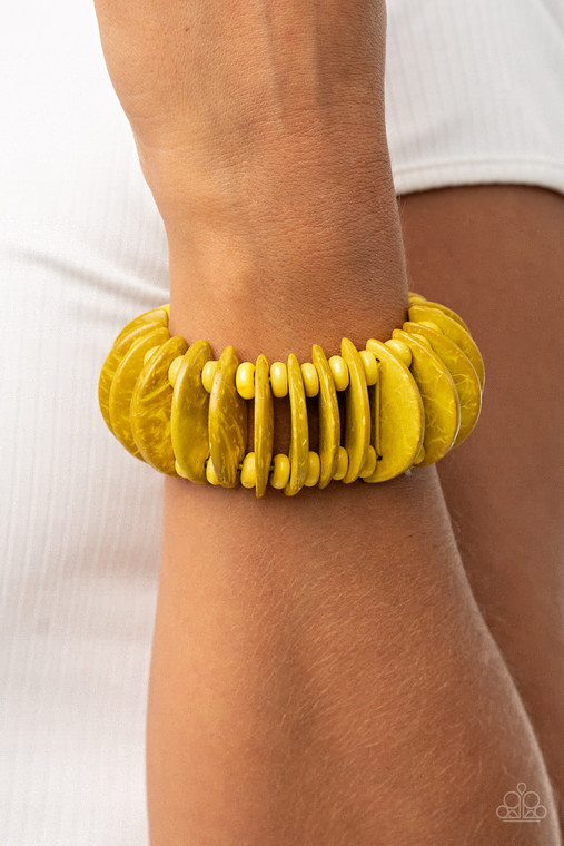 Infused with yellow wooden beads, distressed yellow wooden crescents are threaded along stretchy bands around the wrist for a summery look.

Sold as one individual bracelet.