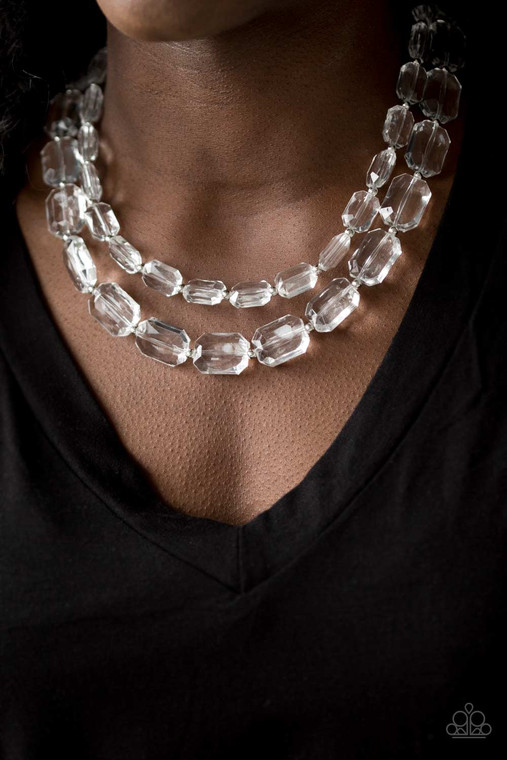 Infused with dainty silver beads, glassy white emerald-cut beads layer below the collar for an edgy look. Features an adjustable clasp closure.

Sold as one individual necklace. Includes one pair of matching earrings.