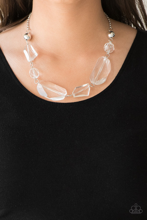 Varying in shape, oversized faceted crystal-like beading links below the collar in a whimsical fashion. Features an adjustable clasp closure.

Sold as one individual necklace. Includes one pair of matching earrings.