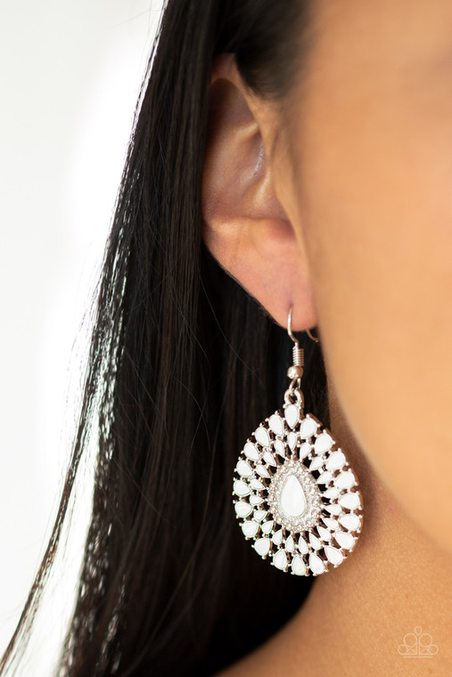 Painted in a neutral white finish, dainty petals flare from a matching teardrop center, creating a whimsical frame. Earring attaches to a standard fishhook fitting.

Sold as one pair of earrings.
