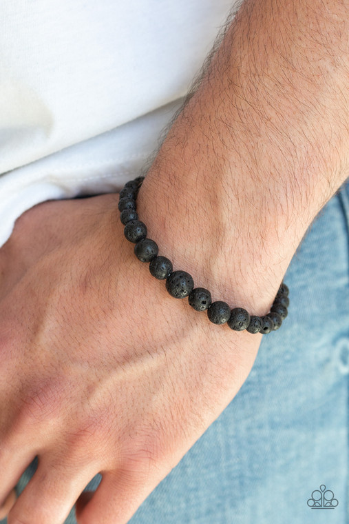 Threaded along a stretchy band, an earthy collection of black lava stones gradually increase in size along the wrist.

Sold as one individual bracelet.