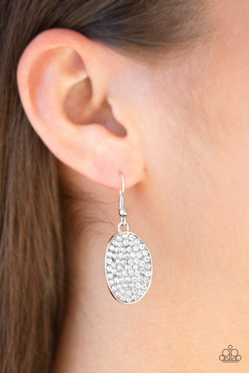 A beveled rose gold frame is encrusted in glittery white rhinestones, creating a blinding shimmer. Earring attaches to a standard fishhook fitting.

Sold as one pair of earrings.