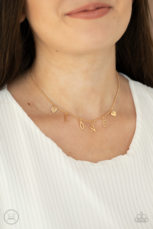 Nestled between a pair of dainty gold hearts, dangling gold letter charms spell out the word, "LOVE," creating a flirty fringe around the neck. Features an adjustable clasp closure.

Sold as one individual choker necklace. Includes one pair of matching earrings.