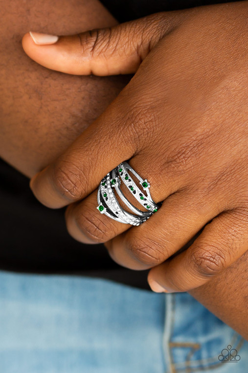 Mismatched silver bands arc across the finger, coalescing into an airy frame. Dainty green and white rhinestones are sporadically sprinkled across the shimmery layers for a refined finish. Features a stretchy band for a flexible fit.

Sold as one individual ring.