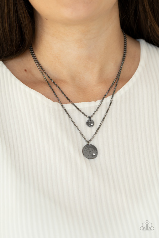 Dotted with dainty white rhinestones, a pair of hammered gunmetal discs delicately layer below the collar for a dainty look. Features an adjustable clasp closure.

Sold as one individual necklace. Includes one pair of matching earrings.