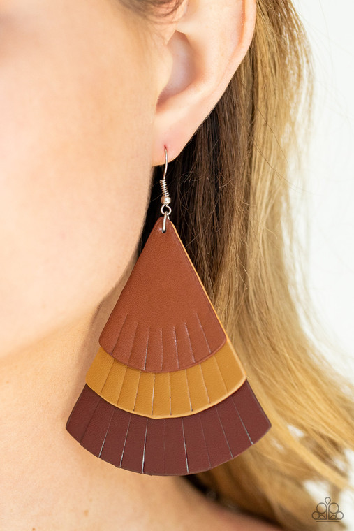 Featuring tapered edges, brown, tan, and Samba leather triangular frames delicately overlap into a colorfully rustic frame. Earring attaches to a standard fishhook fitting.

Sold as one pair of earrings.