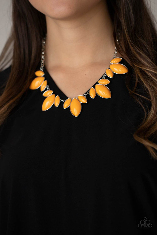 Trios of Marigold marquise shaped beads connect into leafy frames below the collar, creating a vivacious centerpiece. Features an adjustable clasp closure.

Sold as one individual necklace. Includes one pair of matching earrings.