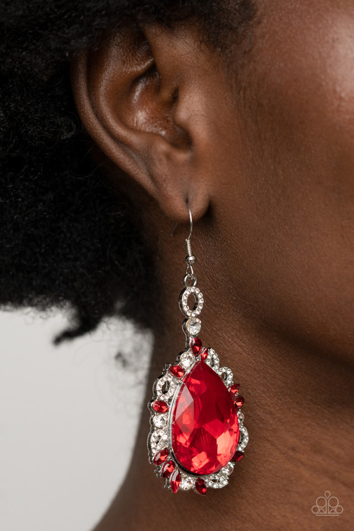 Featuring round, teardrop, and oval shapes, red and white rhinestone encrusted filigree borders a dramatically oversized red rhinestone teardrop for a jaw-dropping dazzle. Earring attaches to a standard fishhook fitting.

Sold as one pair of earrings.