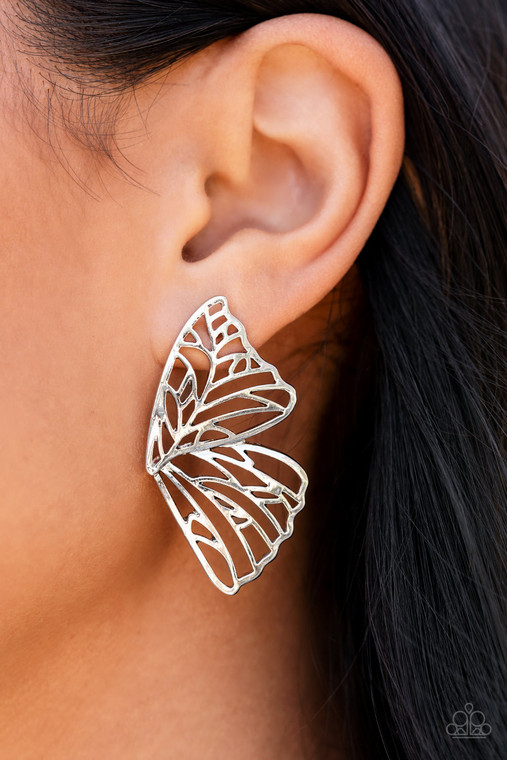 Shimmery silver bars delicately climb scalloped silver frames, coalescing into a whimsical butterfly wing. Earring attaches to a standard post fitting.

Sold as one pair of double-sided post earrings.