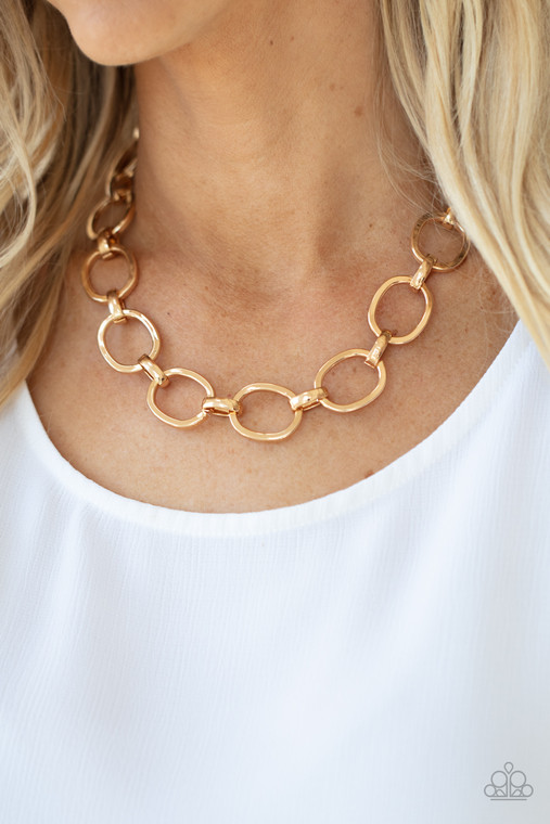 A glistening series of dramatically oversized ovals and links boldly connect below the collar, creating an intense industrial statement. Features an adjustable clasp closure.

Sold as one individual necklace. Includes one pair of matching earrings.