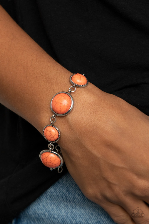 Featuring studded and plain silver frames, small and large orange stones delicately alternate around the wrist for a rustic flair. Features an adjustable clasp closure.

Sold as one individual bracelet.