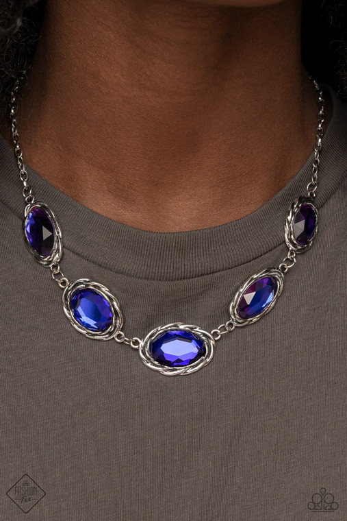 Brushed in a subtle metallic finish, a collection of variegated oval multicolored purple gems connect end to end along the collar. Antiqued silver frames, embellished with a layered rope texture, wrap around each of the brilliant gems for a rustically refined finish. Features an adjustable clasp closure.

Sold as one individual necklace. Includes one pair of matching earrings.