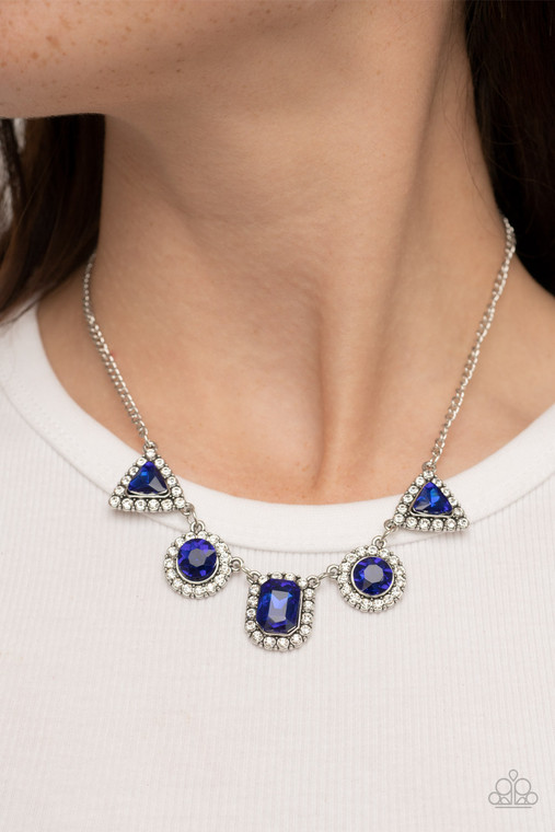 Featuring triangular, round, and emerald style cuts, a glittery collection of blue rhinestones are bordered in glassy white rhinestones as they delicately link below the collar for a sparkly statement. Features an adjustable clasp closure.

Sold as one individual necklace. Includes one pair of matching earrings.