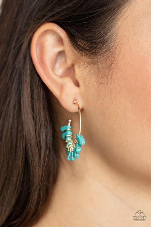 Flared turquoise stones and dainty gold discs alternate along a dainty gold hoop, creating an earthy fringe. Earring attaches to a standard post fitting. Hoop measures approximately 1 1/2" in diameter.

Sold as one pair of hoop earrings.