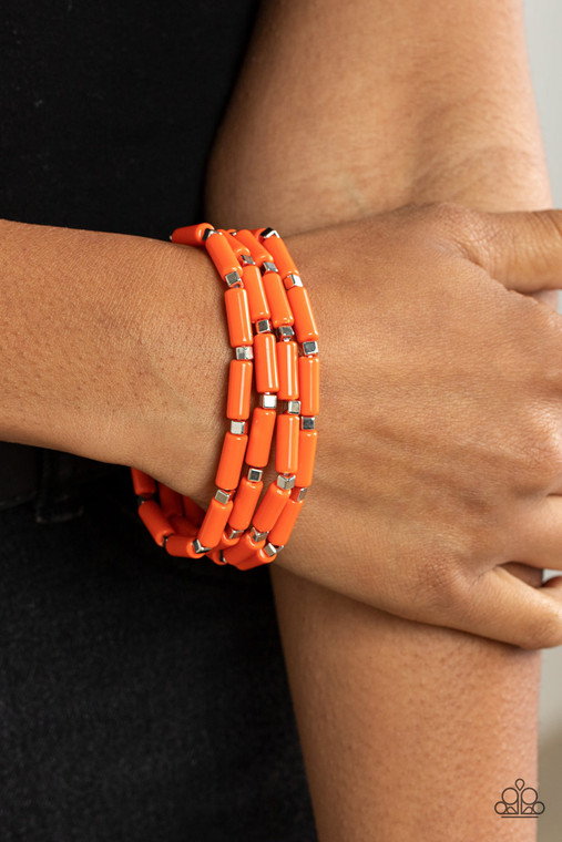 A playful collection of dainty silver cube beads and cylindrical orange beads are threaded along stretchy bands, creating colorful layers around the wrist.

Sold as one set of four bracelets.