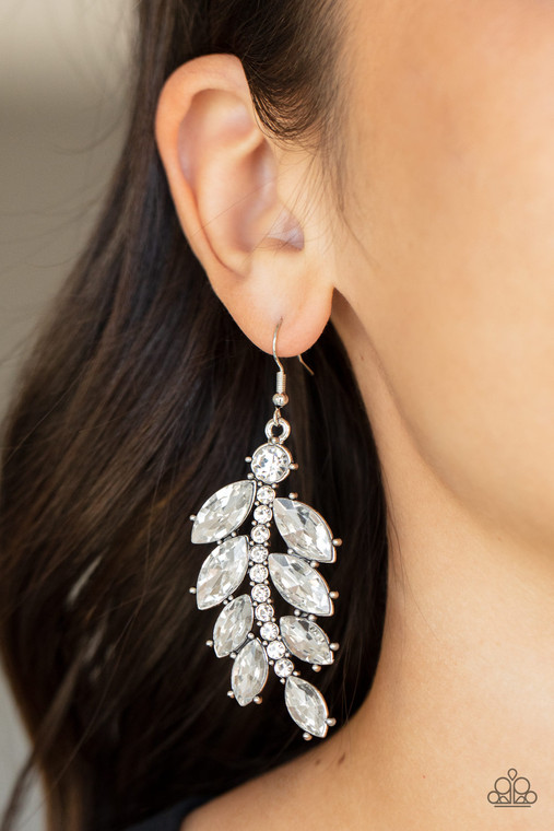 Oversized marquise cut white rhinestones fan out from a curved silver bar encrusted in glassy white rhinestones, resulting into a glamorously leafy statement piece. Earring attaches to a standard fishhook fitting.

Sold as one pair of earrings.