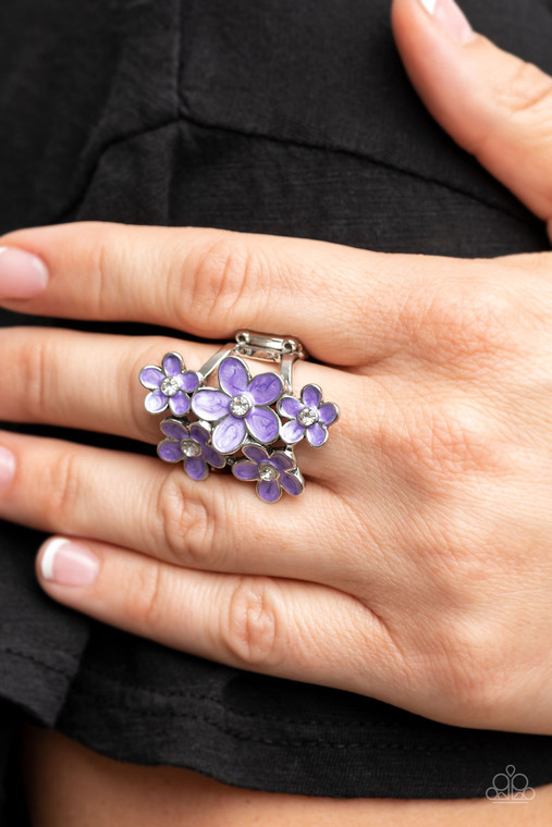 Dotted with dainty white rhinestone centers, a bouquet of shiny purple flowers blooms across the finger for a sensational seasonal look. Features a stretchy band for a flexible fit.

Sold as one individual ring.