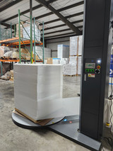 Wrapping a Dark Pallet with Opaque White Machine Film