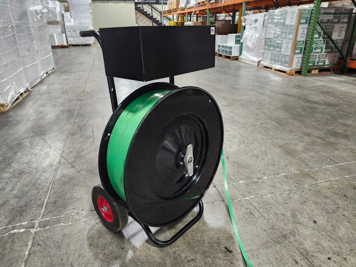 Loading the EP-3100 Premium Poly and Steel Strapping Dispenser.  