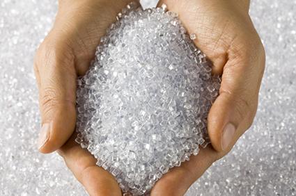 plastic resin two hands holing plastic resin pellets