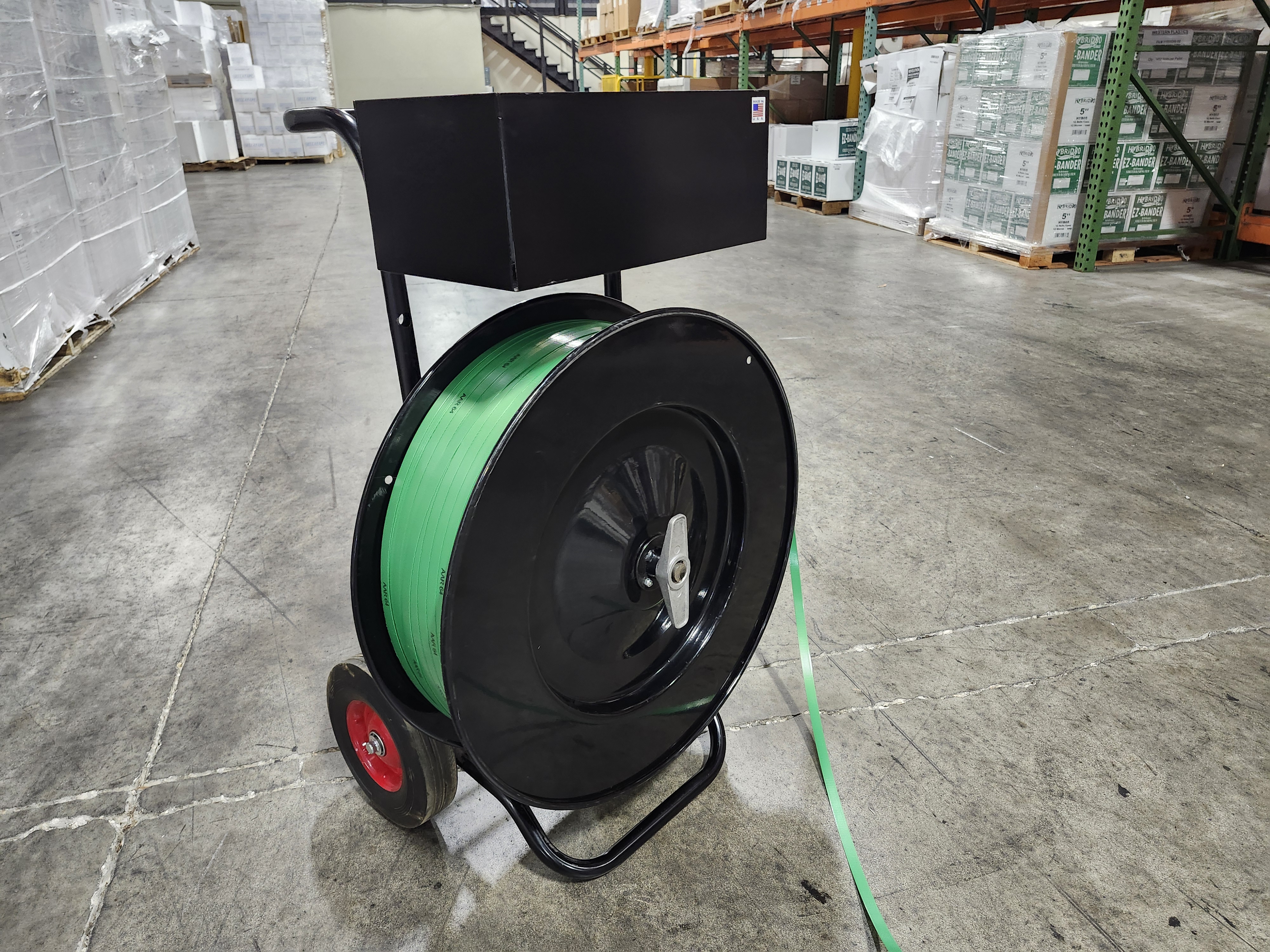 Loading the EP-3100 Premium Poly and Steel Strapping Dispenser.  