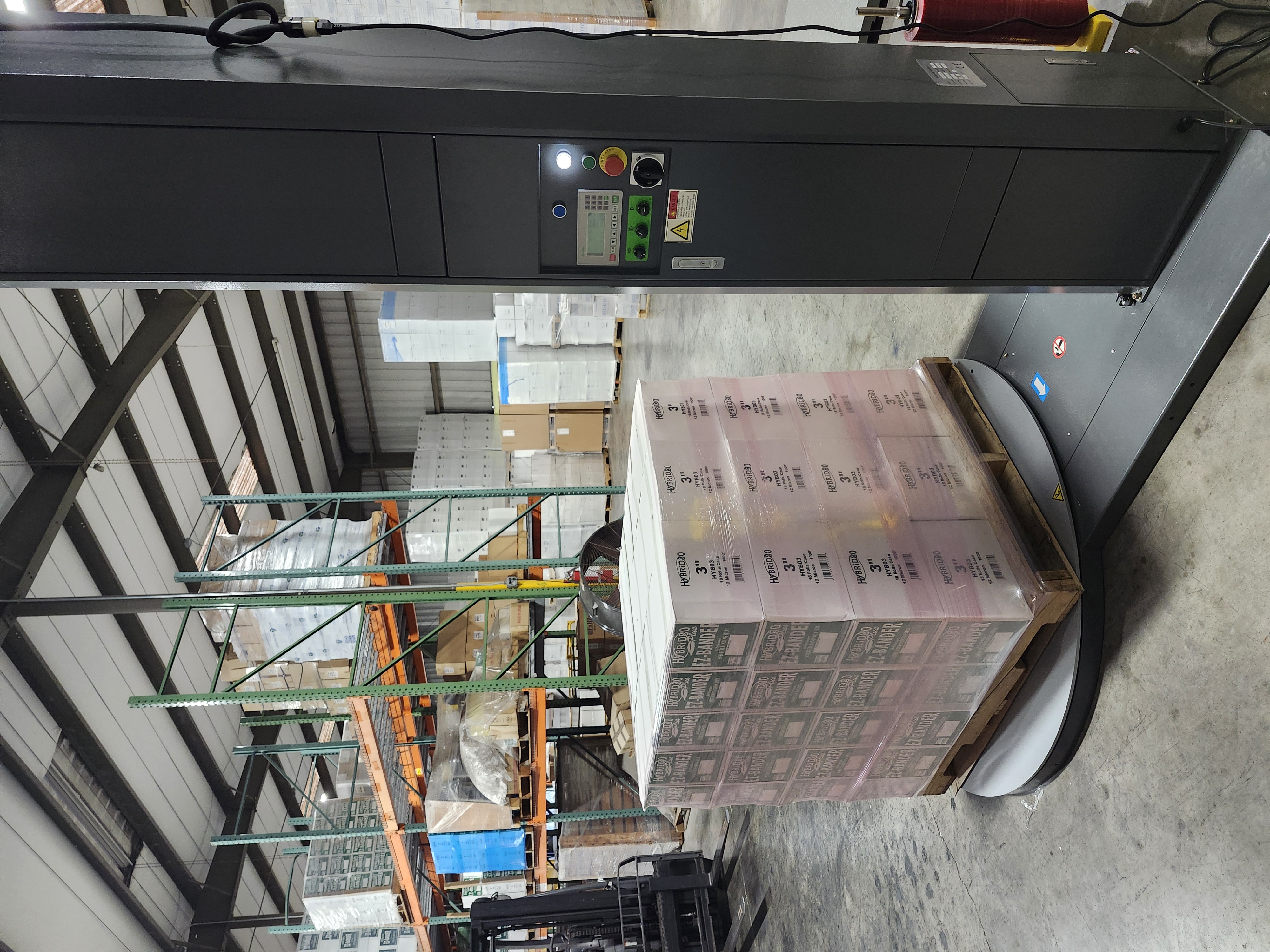 Wrapping a Pallet with Red Tint Stretch Film Stretched at 225%